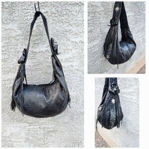 Jumar Drew black shoulder bag, wide strap with metal studs and flower,‎